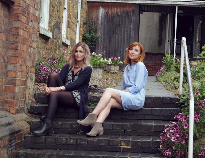 two bloggers sat on steps ax paris playsuit shirt dress