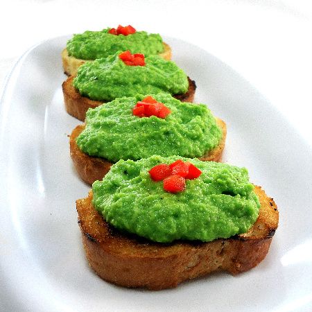 The perfect Grinch Night appetizer! Crostini with Pea Pesto via One Perfect Bite || Grinch Night! A Fun Family Christmas Tradition! || Letters from Santa Holiday Blog